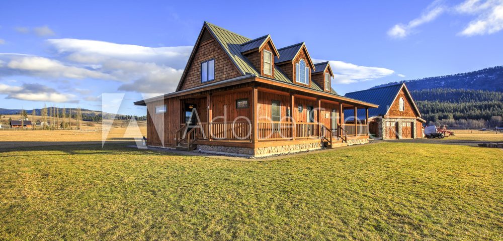 Nice wooden ranch home with beautiful landscape in the countryside.